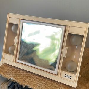 Very vintage makeup mirror -two sided mirror flip works great